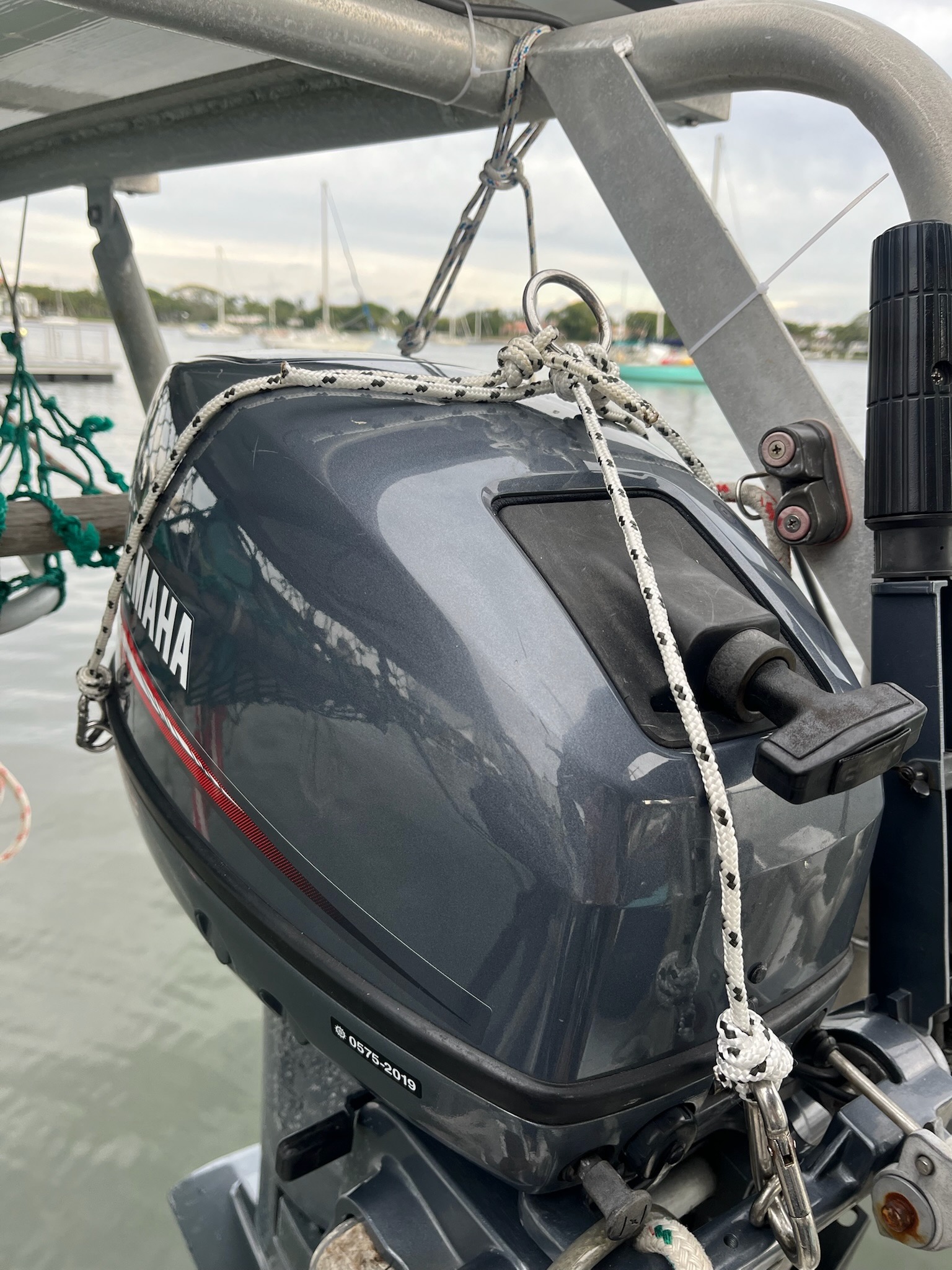 Yamaha outboard mounted on the custom stern davits