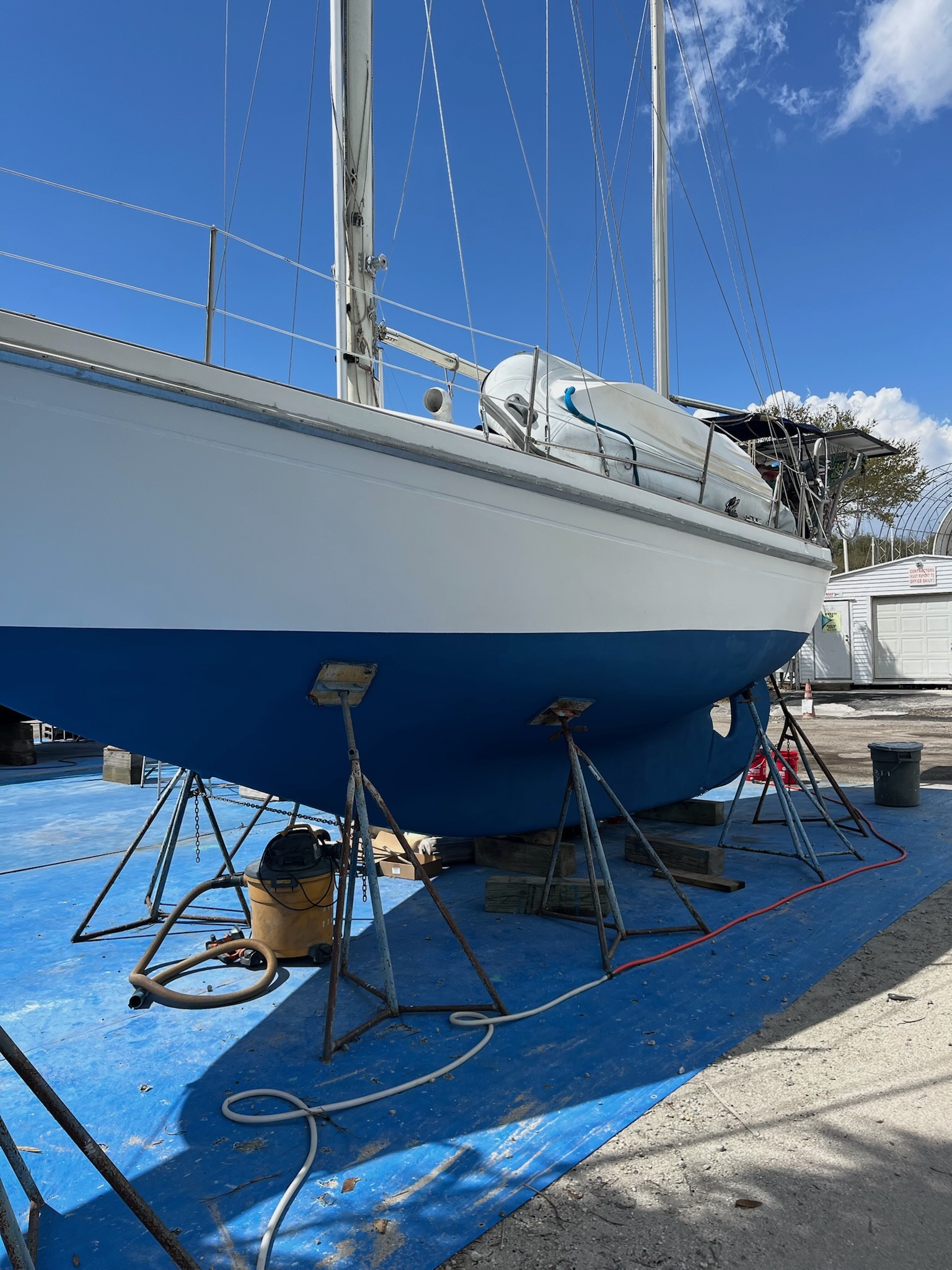 Seawind II hauled out showing fresh blue bottom paint