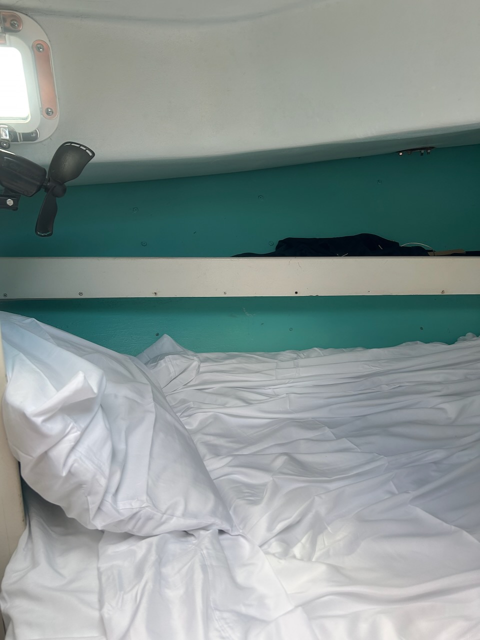 V-berth with overhead hatch and 12V fan